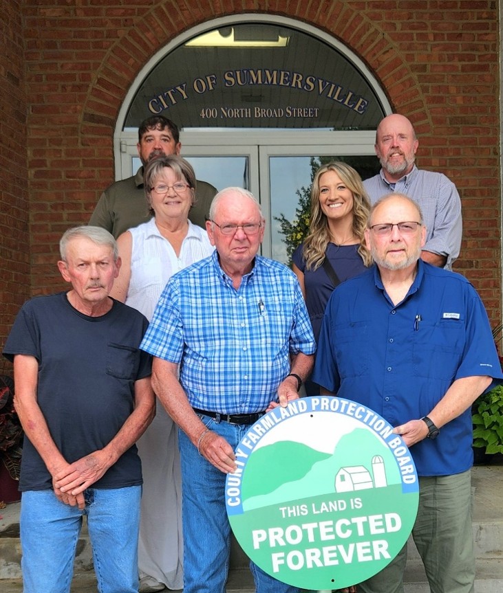 Photo of Nicholas County Farmland Protection Board in front of City of Summersville building